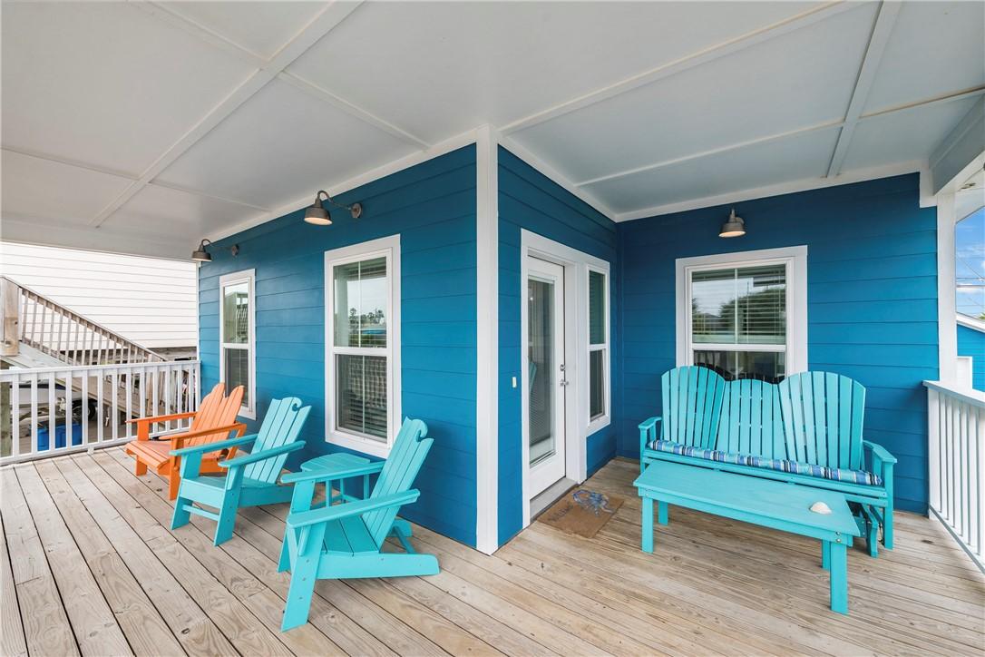 Image 3: Front porch faces the predominate wind direction (
