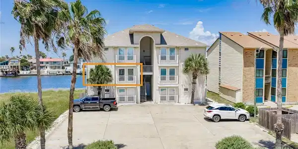 Image 2: Front of structure - Unit 201 on second floor.