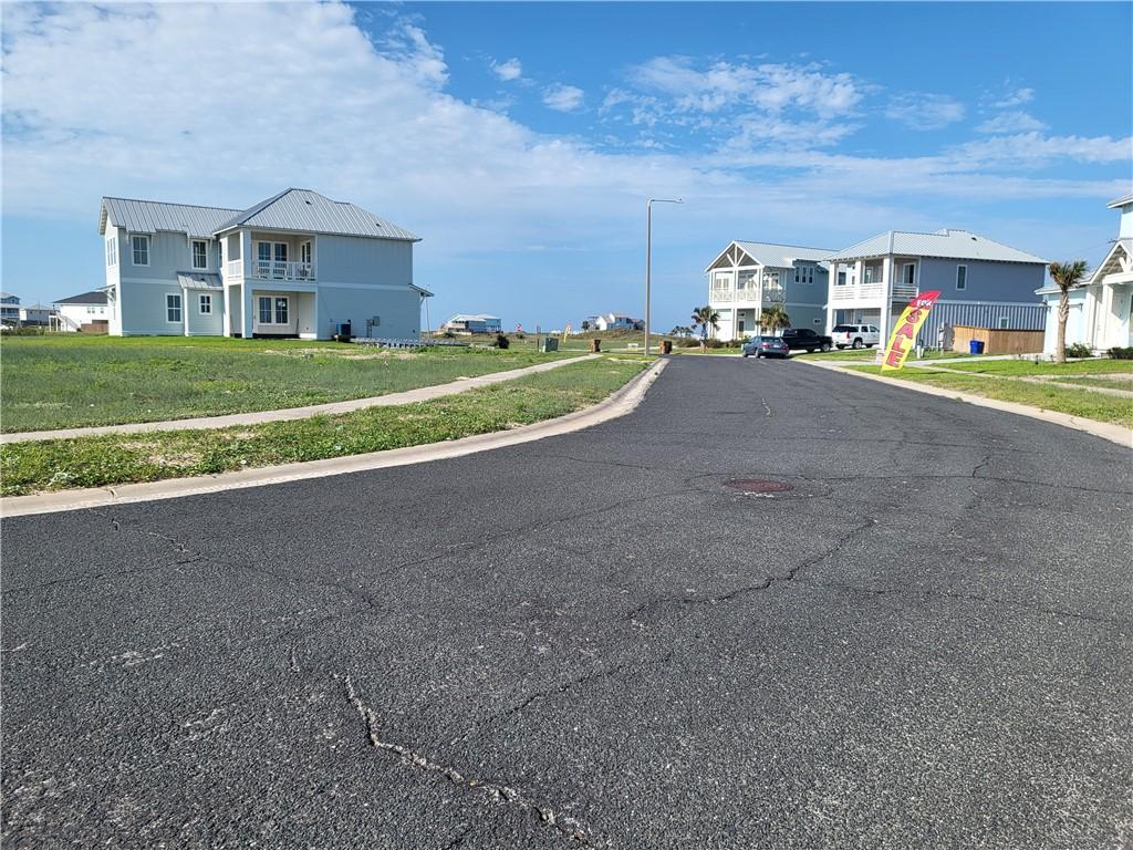 Image 2: standing in front of lot