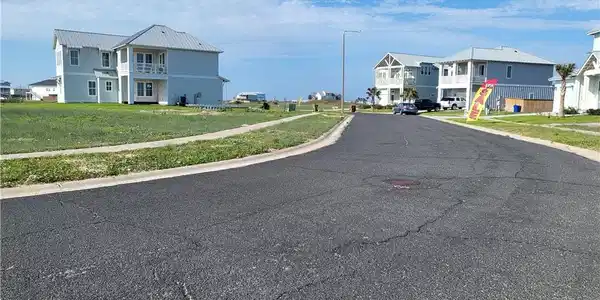 Image 2: standing in front of lot