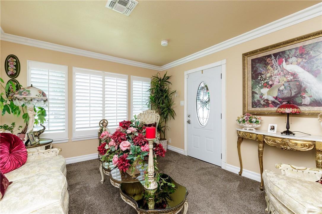 Image 4: Living Room view of entrance