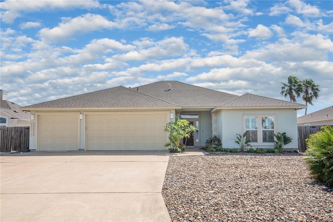Image 2: Three car garage and large driveway!