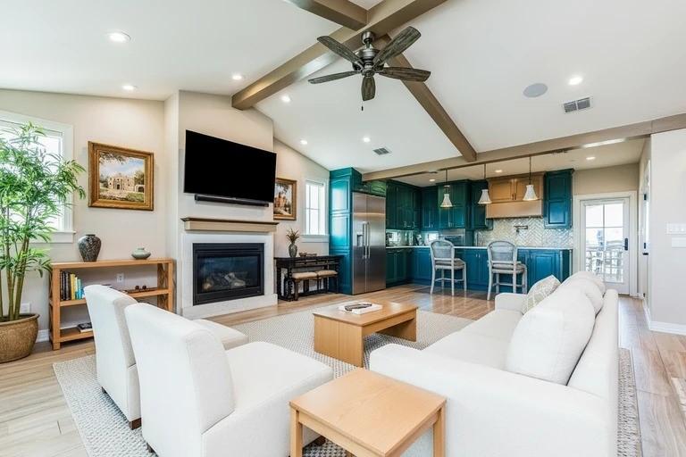 Image 4: Vaulted third floor grand room virtually staged