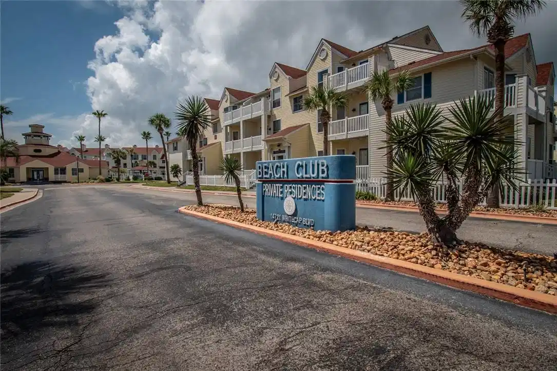 Image 1: Beach Club Condos, located within one block of the