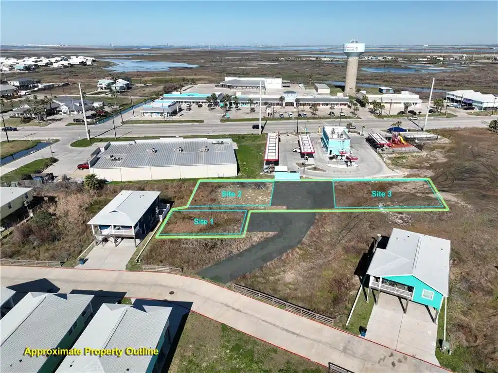 Image 1: Drone showing Driveway to potentially 3 1500+ Sq.
