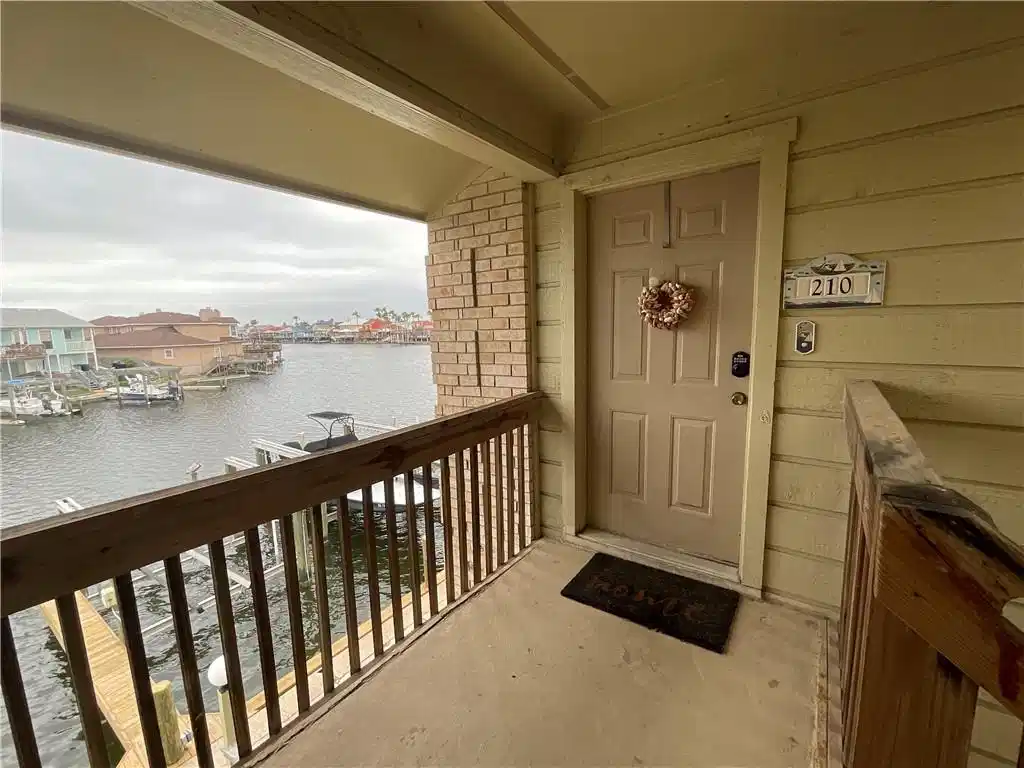 Image 1: Front door covered entry