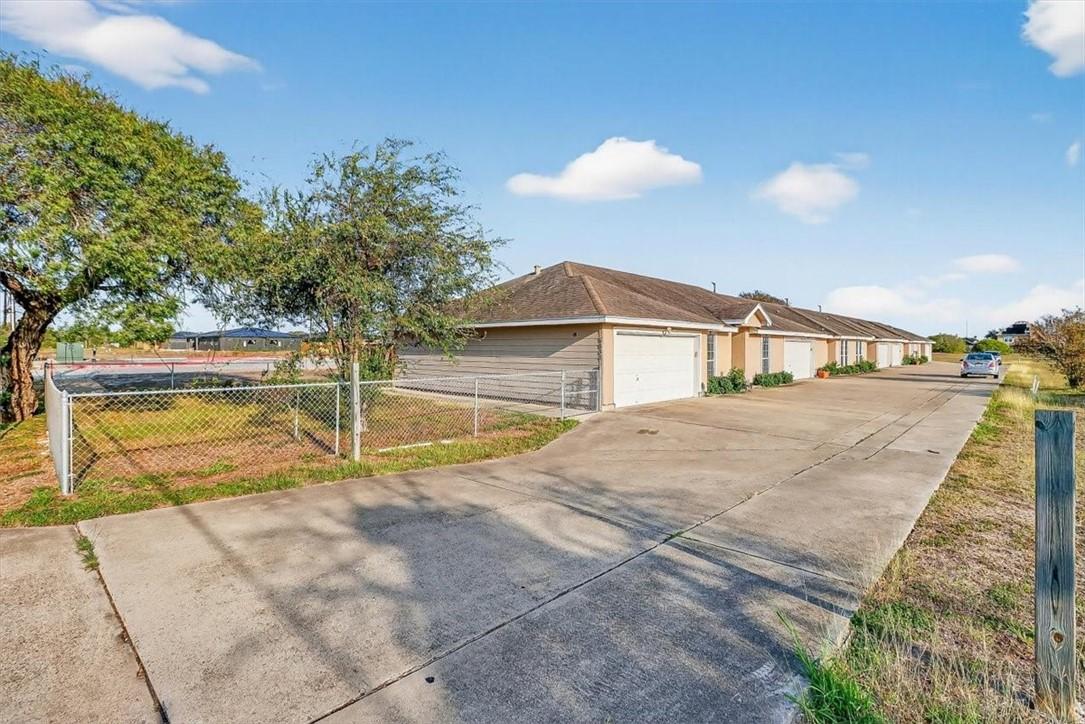 Image 2: Corner Unit & HOA Common area fenced yard