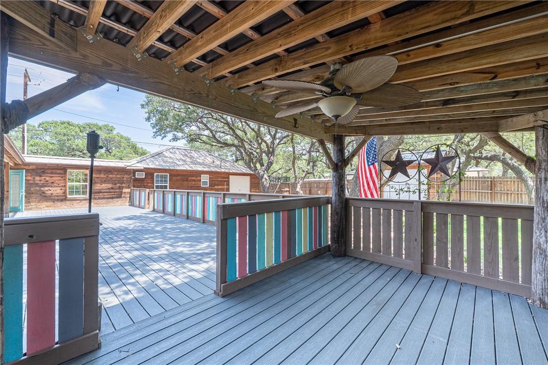 Image 3: Expansive covered outdoor living area&mdash;ideal for ba
