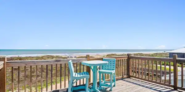 Image 2: The view will capture you from this home. Two balc