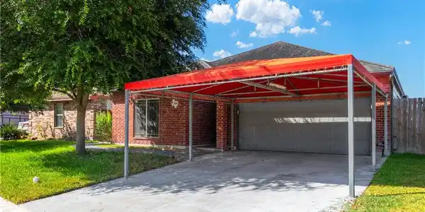 Image 4: Carport helps keep cars in the shade