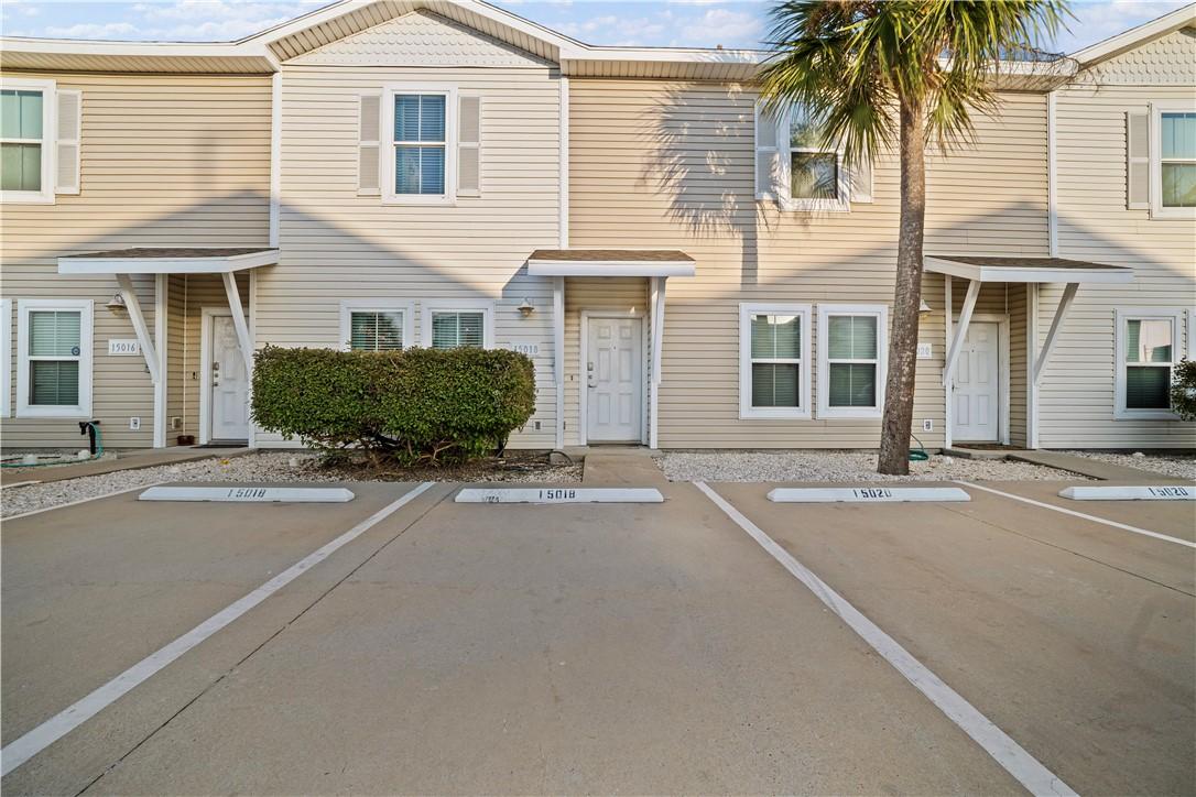 Image 1: One block from the beach