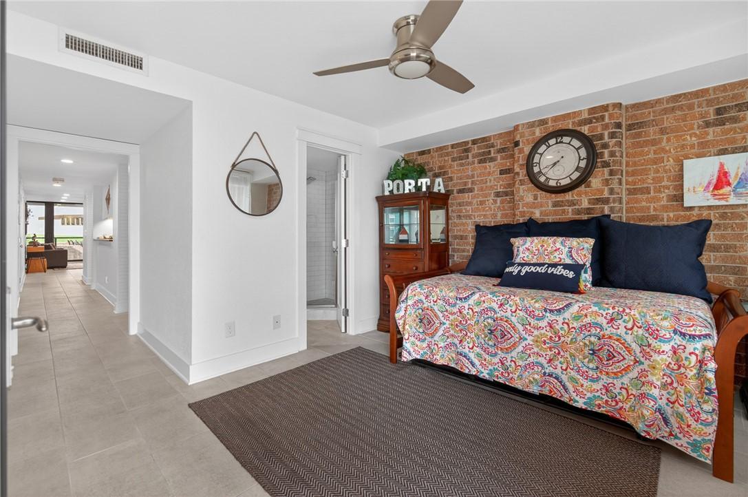 Image 4: Entry den and bathroom.