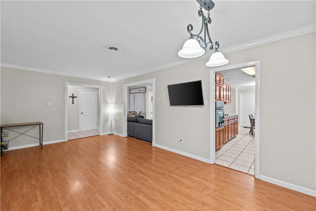Image 4: Formal Dining Room Looking into the Entryway, Livi