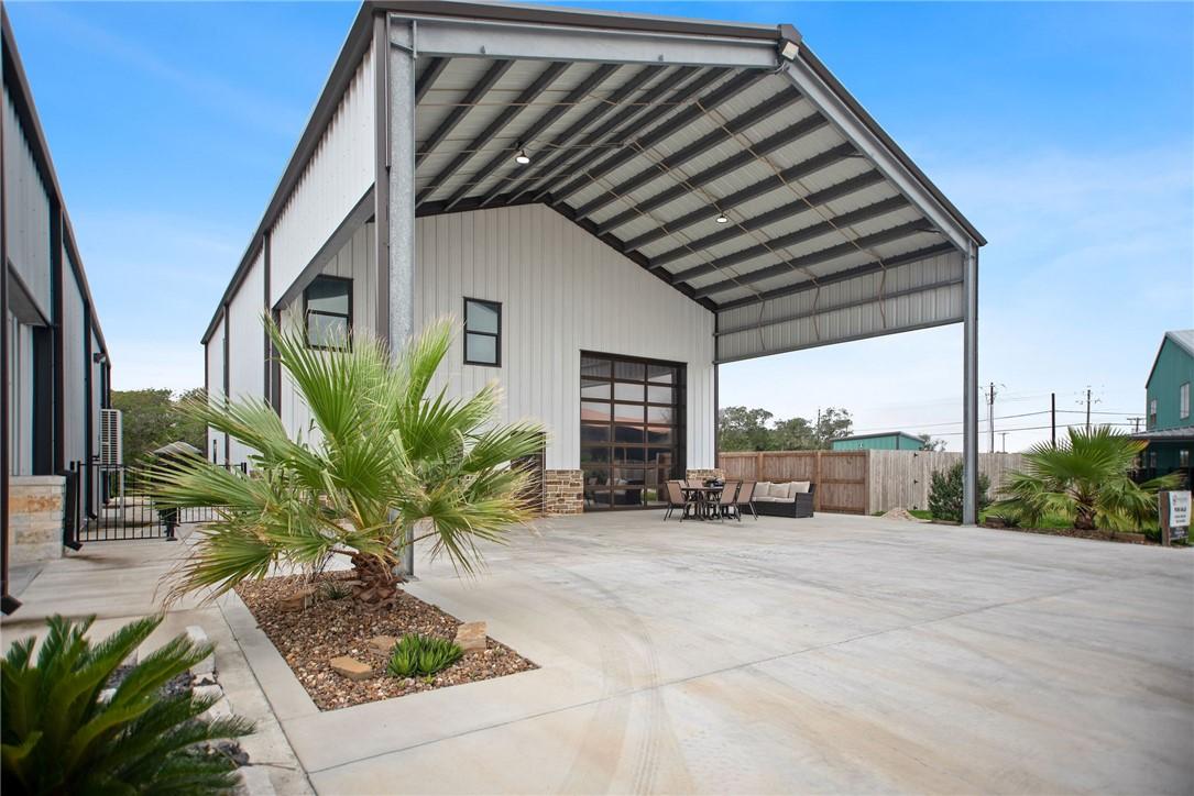 Image 2: Front Street View of the property with custom roll