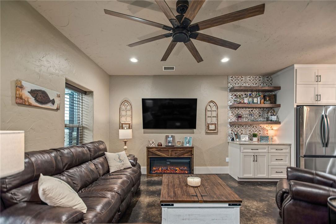 Image 4: Family Room with Dry Bar