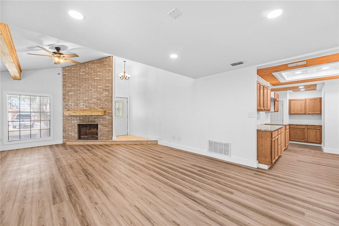 Image 4: From dining room looking towards entry and access