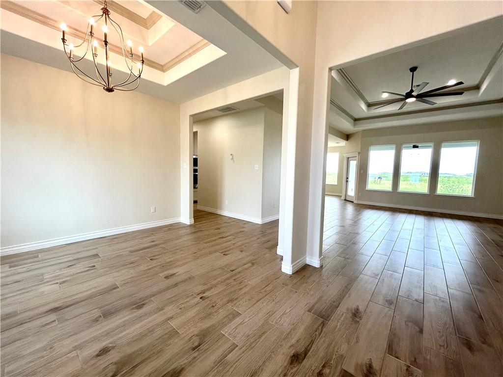 Image 3: Looking in from the foyer to the dining and living