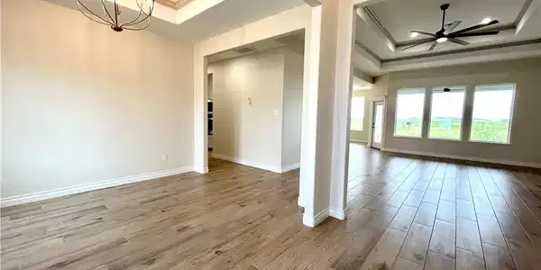 Image 3: Looking in from the foyer to the dining and living