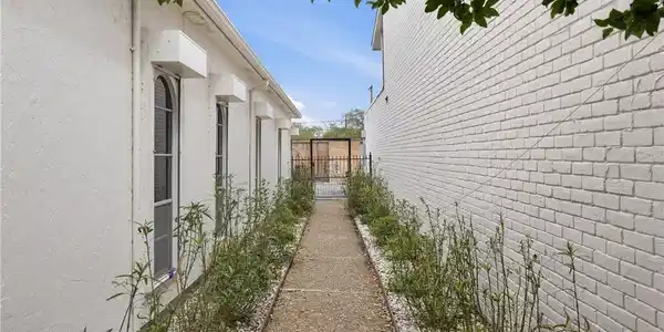 Image 4: #34 is end unit to the left (bedroom windows)
