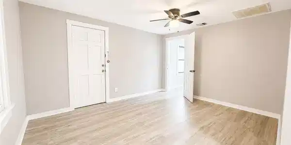 Image 3: VIew of Living Room from Dining Area