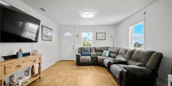 Image 4: Bright open living area designed for relaxing afte