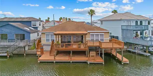 Image 2: Back of home with multi-level decks