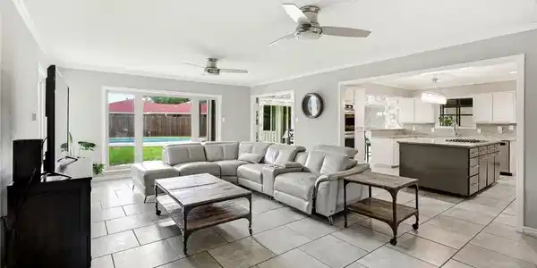 Image 4: second living space open to the kitchen and large