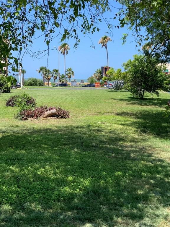 Image 2: Rear view from 1121 Ocean Dr.  (lot)