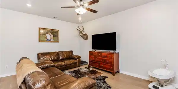 Image 4: Warm Neutral Color Scheme Throughout Home