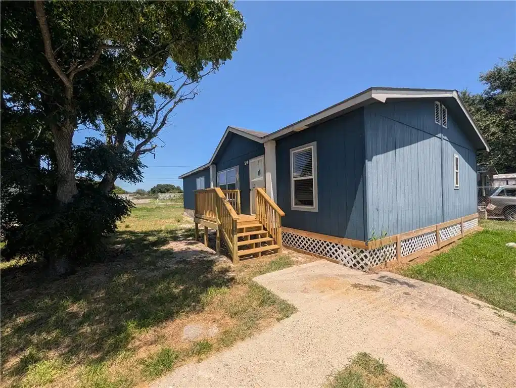 Image 1: Front west side view