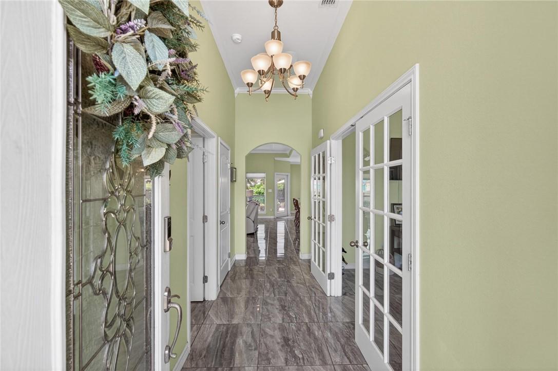Image 2: Stunning entry - tile flooring throughout.