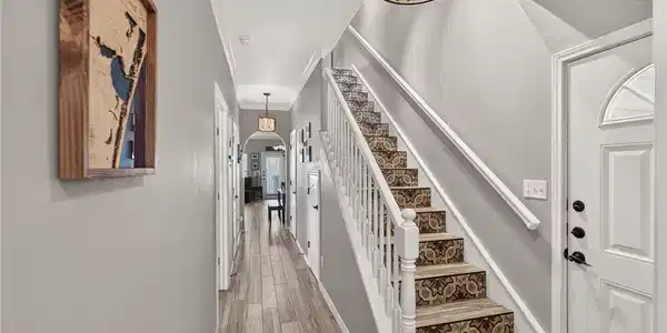 Image 3: "Come In" unique tile accent stairway.