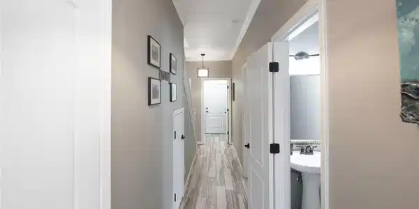 Image 4: Beautiful ceramic wood look tile throughout.
