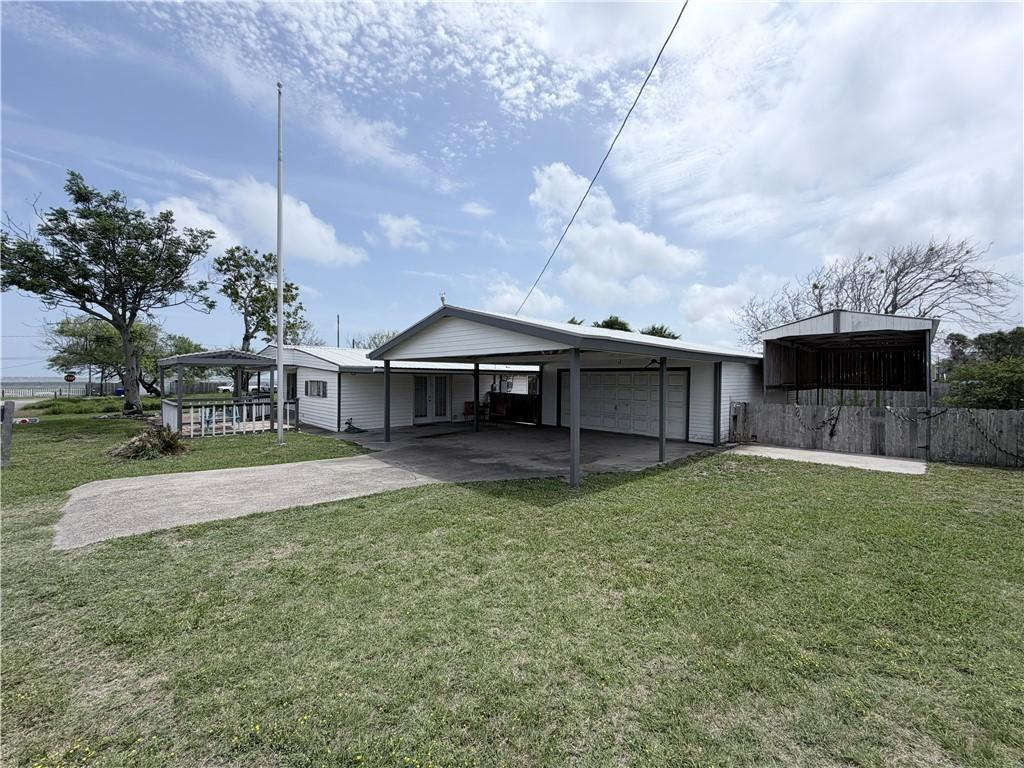 Image 3: Front Garage and Garage Port