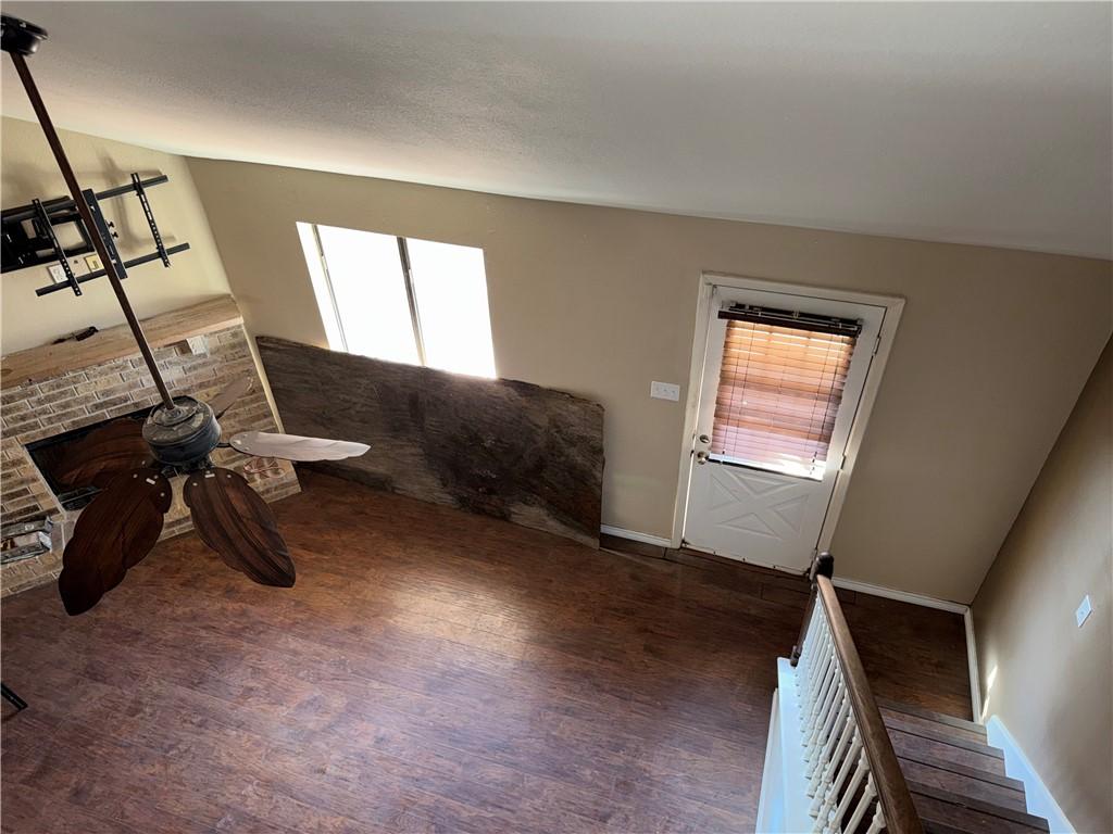 Image 4: Loft bedroom view to downstairs, with woodburning