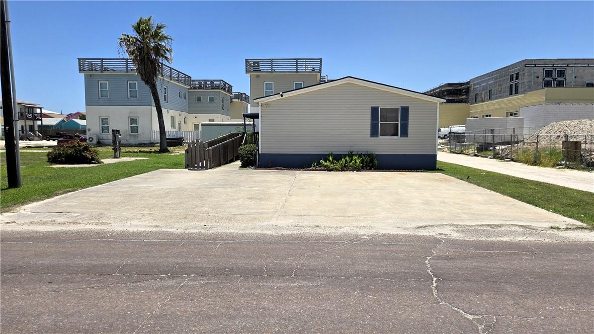 Image 3: The property has a 40' wide by 30' deep driveway