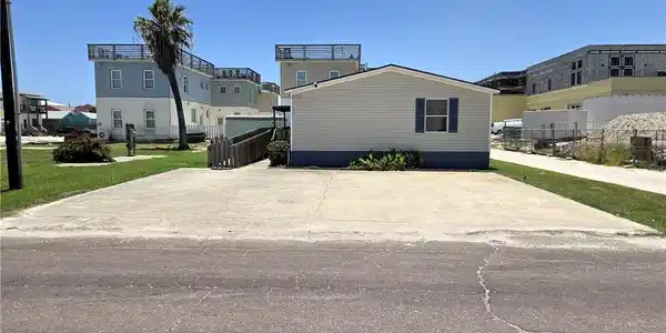 Image 3: The property has a 40' wide by 30' deep driveway