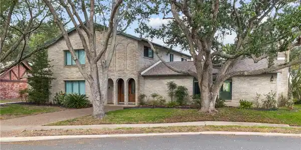 Image 2: Timeless brick architecture creates an impressive