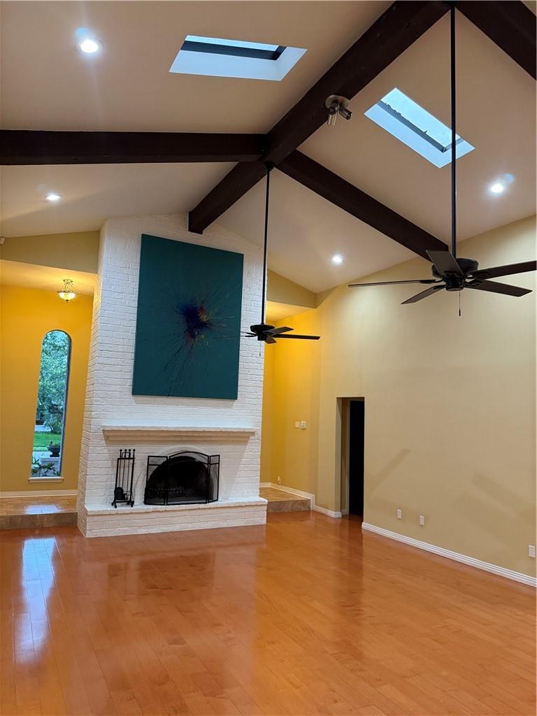 Image 3: Main living room with vaulted ceiling
