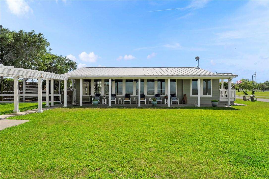 Image 4: Main House with covered porch overlooking Copano B