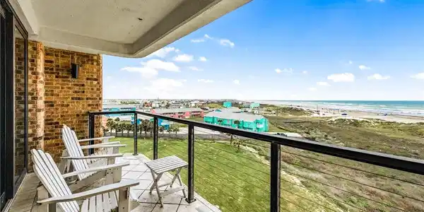 Image 3: Sitting on the balcony watching the gulf!