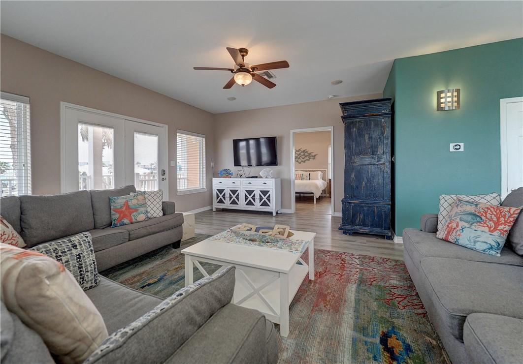 Image 3: Main living room is located upstairs.