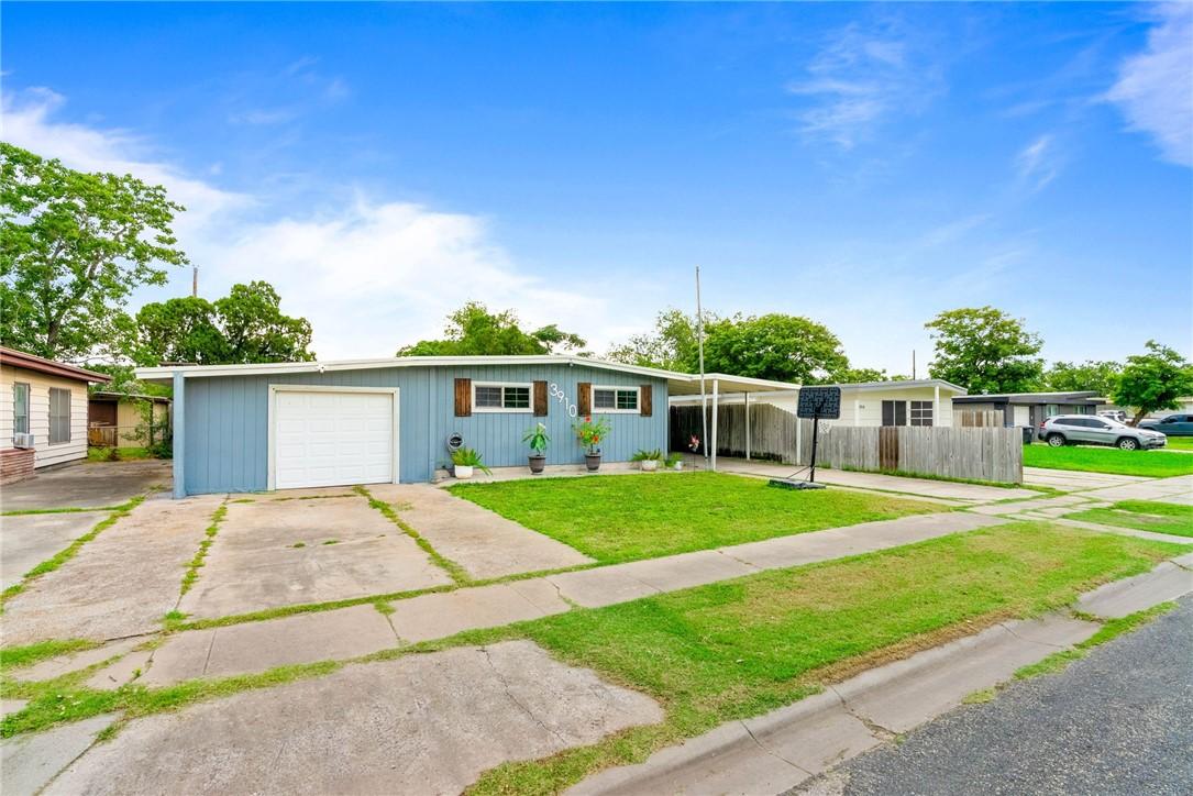 Image 1: One car garage and carport