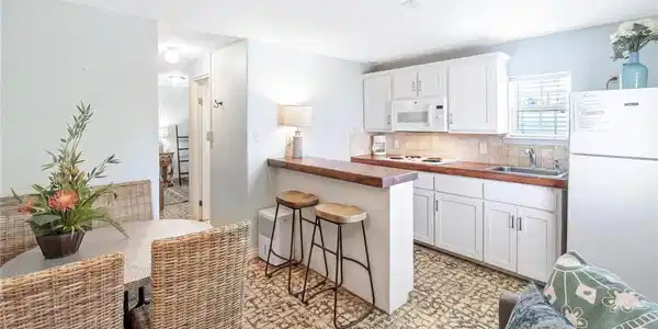 Image 3: Dining Area and Kitchen