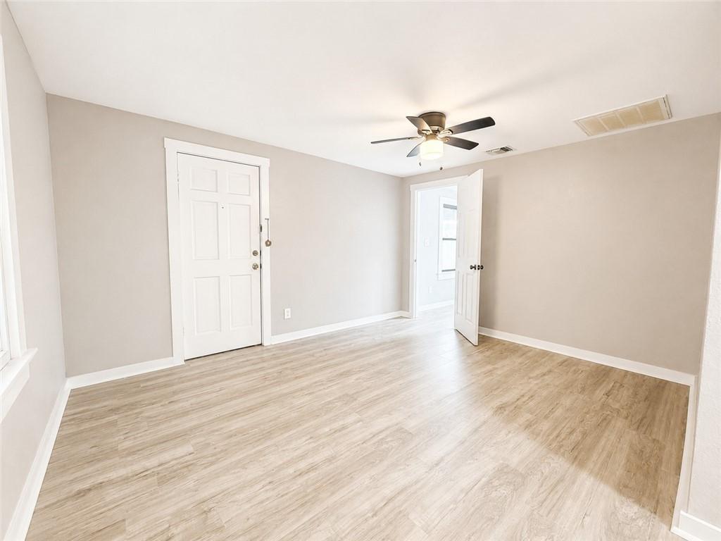 Image 3: VIew of Living Room from Dining Area