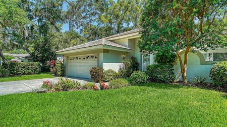 7017 WOODSIDE OAKS CIRCLE
