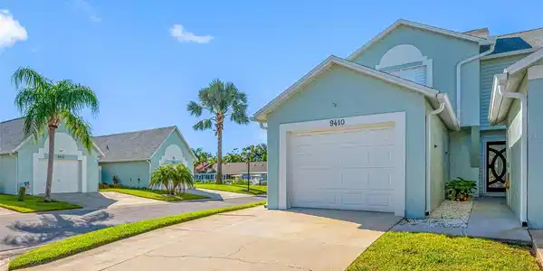 9410 TARA CAY COURT