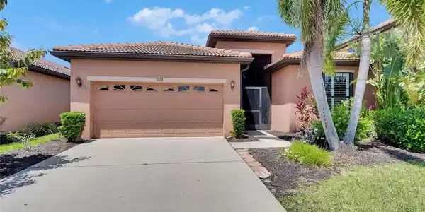 5728 SUNSET FALLS DRIVE