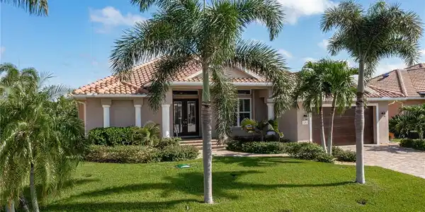 320 PALM ISLES COURT