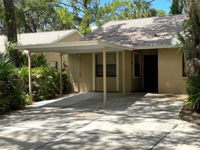 4877 VILLAGE GARDENS DRIVE